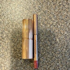 Charlotte Tilbury Gold Lipstick and Deep Red Liner
